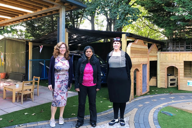 Rupa Huq MP (centre) with staff on a visit after the flooding 