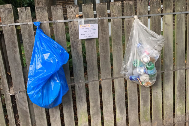 Blue for general waste, transparent for cans and bottles 