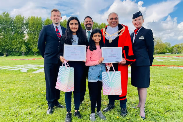 Mural designers Raya and Jasmine with the Mayor of Hounslow, the council leader and BA staff 
