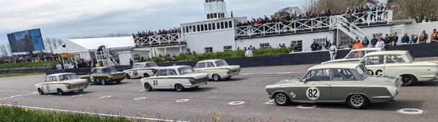 A race grid with 33 Lotus Cortinas
