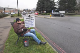 Man Braves Cold to Protest at Tesco Osterley