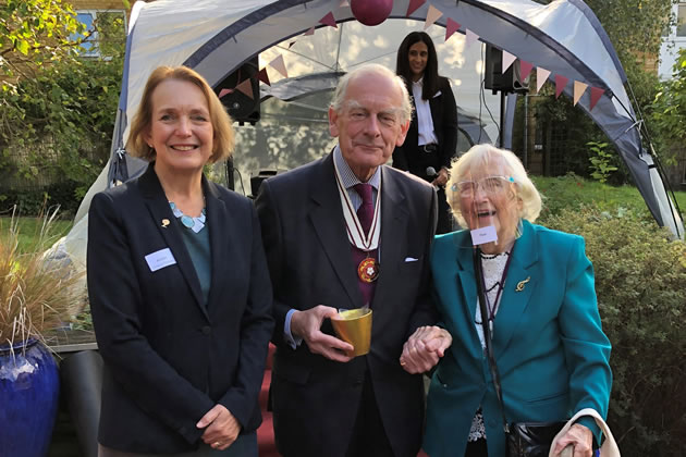Pam Alexandra (right) the centre's longest serving volunteer receives her reward 
