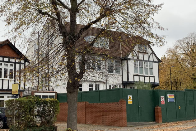 The house on Corfton Road is currently surrounded by hoardings