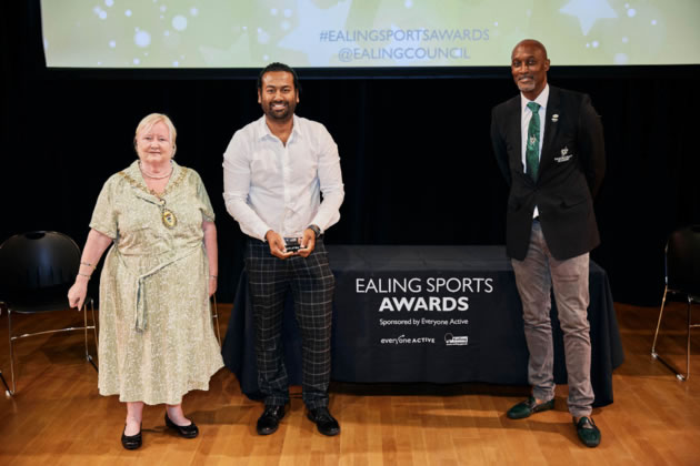 Tanvir Ahamed of London Tigers receives his coach of the year award with Mayor of Ealing, Councillor Yvonne Johnson and high jumper Dalton Grant 