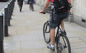Cyclist on pavement