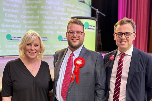 Dominic Moffitt (centre) after his win in Northolt Mandeville