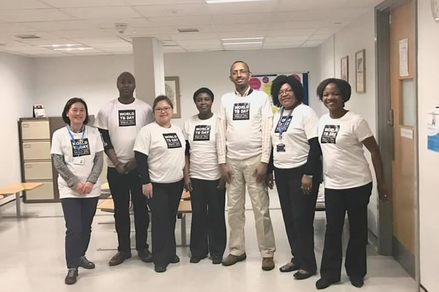 Ahmed Yassin, third from right, and colleagues work to help TB patients