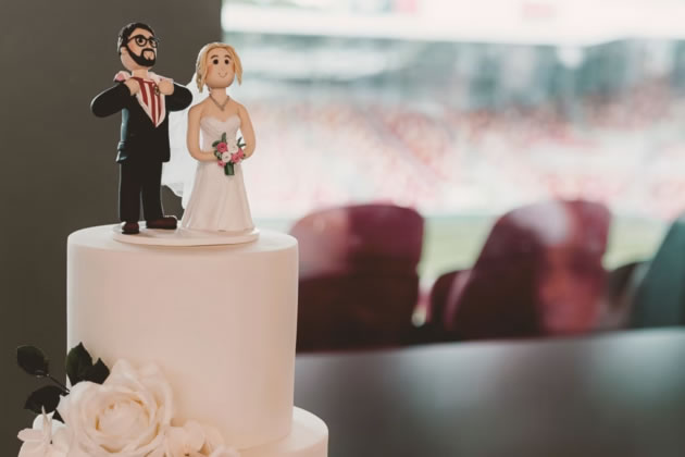 Reese is wearing a Brentford shirt under his wedding suit on the birthday cake