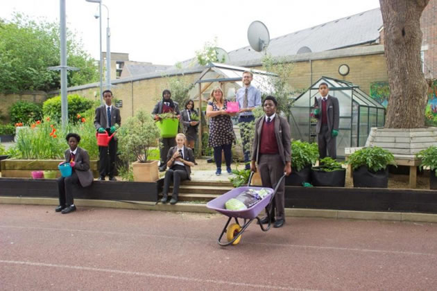 Pupils with the school's environmental and sustainability lead Vanessa Hodder and geography teacher Sam Pillow