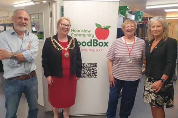 The Mayor (second left) with the Deputy Lieutenant of London (far left) at Hounslow Community Foodbox