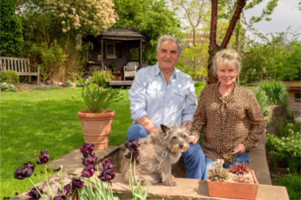Jim Carter in his Hampstead garden with wife Imelda Staunton and dog Molly. Picture: Greenfingers 